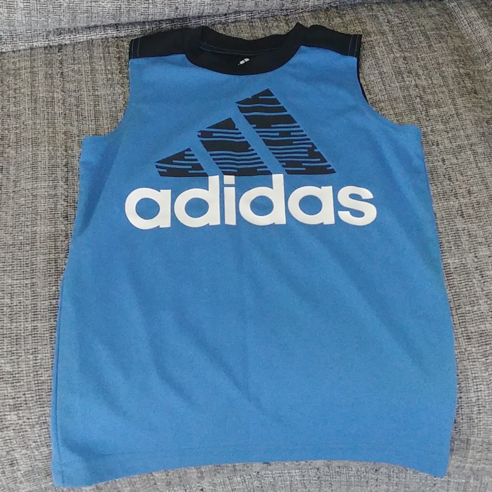 Adidas sleeveless boys dri fit shirt.